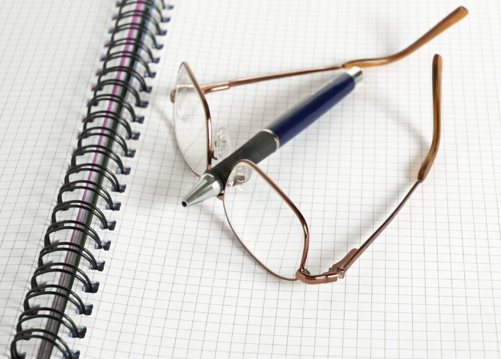 biro, business, glasses, office, pen, reading, spectacles, work, writing, educate, education, knowledge, learn, learning, notebook, paper, student, supplies, write