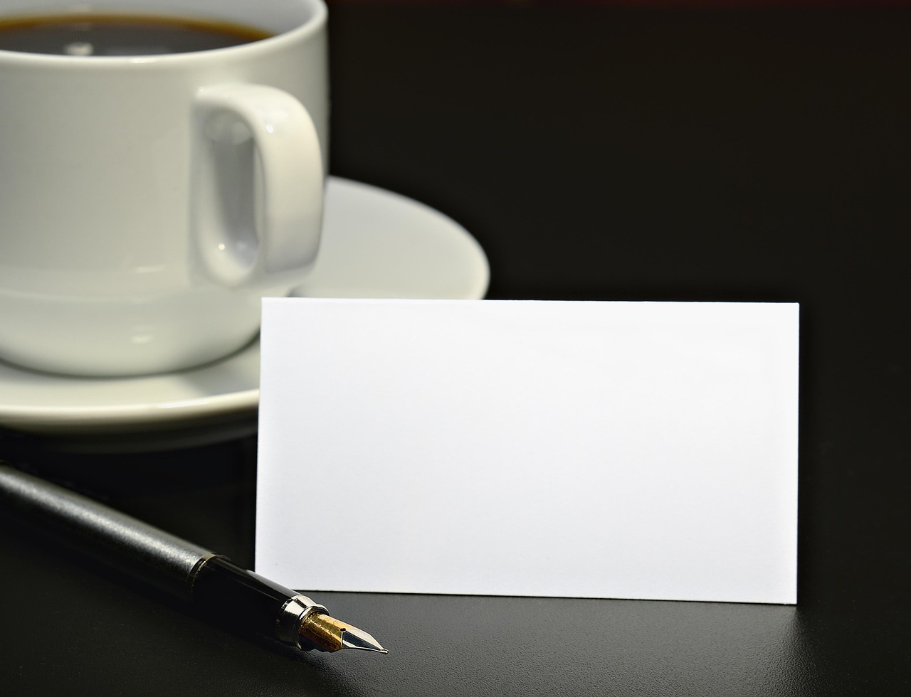 coffee, cup, card, white, table, greetings, paper, drink, caffeine, black, text, mug, note, coffee cup, brown, day, break, breakfast, pen, refreshment, hot, sweet, beverage, blank, present, cafe