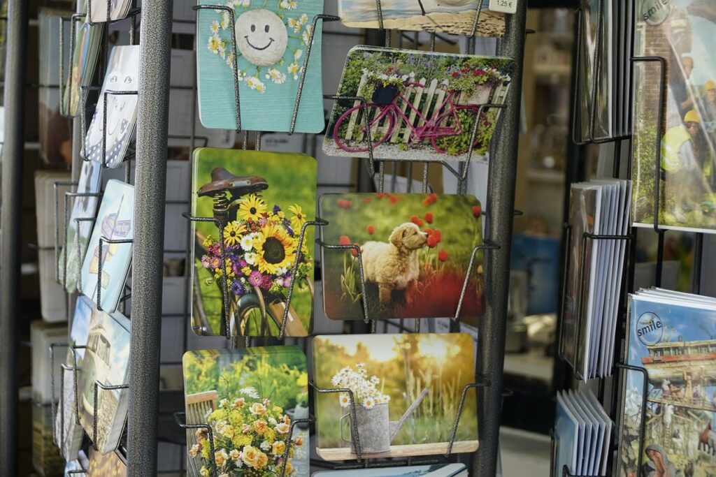 postcard, postcard rack, flowers, bicycle, sheep, animals, field, flower wallpaper, smiley face, countryside, gardening, rose, rose flower, sunflower, red, graffiti, nature, usability, art, beautiful flowers, flower background, sunny, cheerful, green