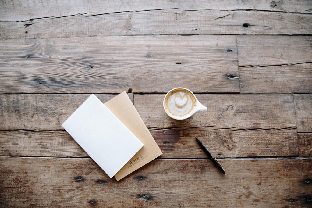 board, desk, pen, surface, table, wood, wooden, coffee, brown coffee, brown wood, brown table, brown desk, brown board, desk, desk, desk, desk, desk, table, table, table, table, wood, coffee, coffee, coffee